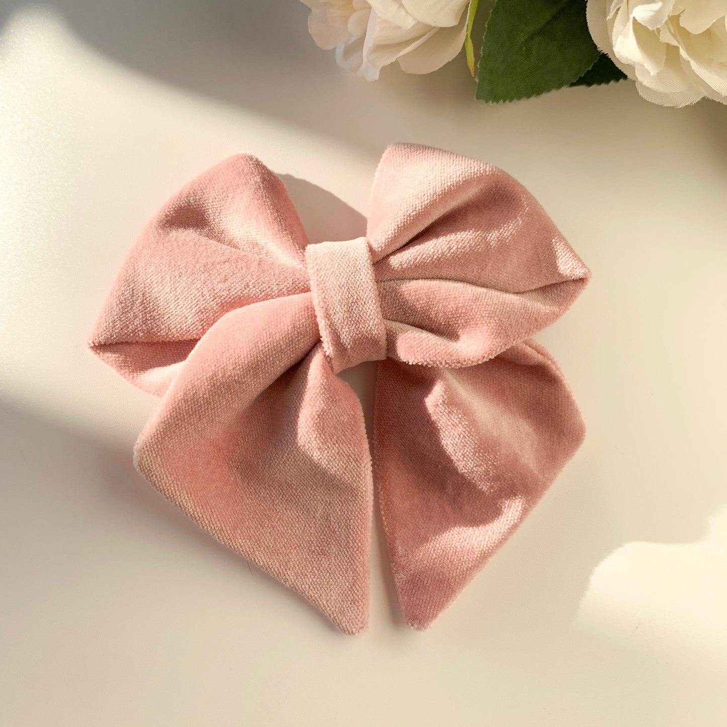 Pink velvet sailor bow